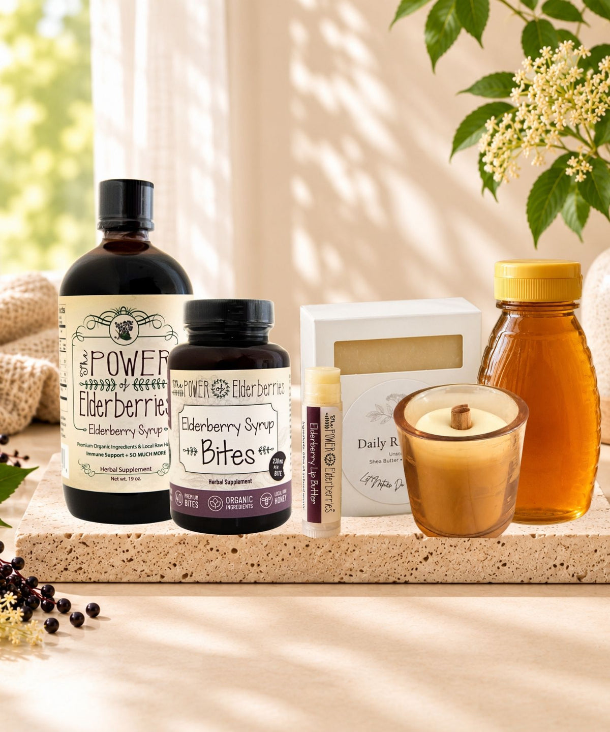Complete Wellness Ritual Bundle with elderberry syrup, Bites, honey, lip butter, votive candle, and handcrafted soap
