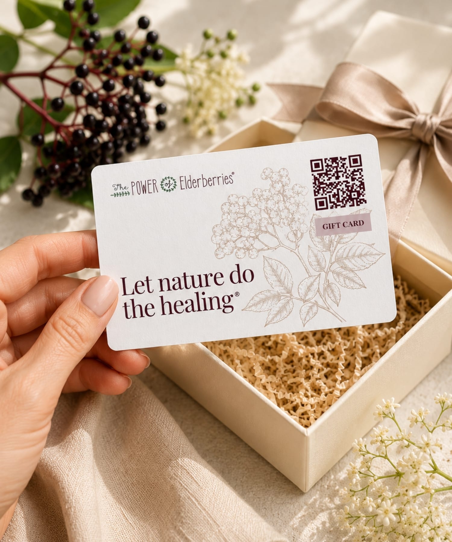 Digital wellness gift card styled with luxury gift box packaging