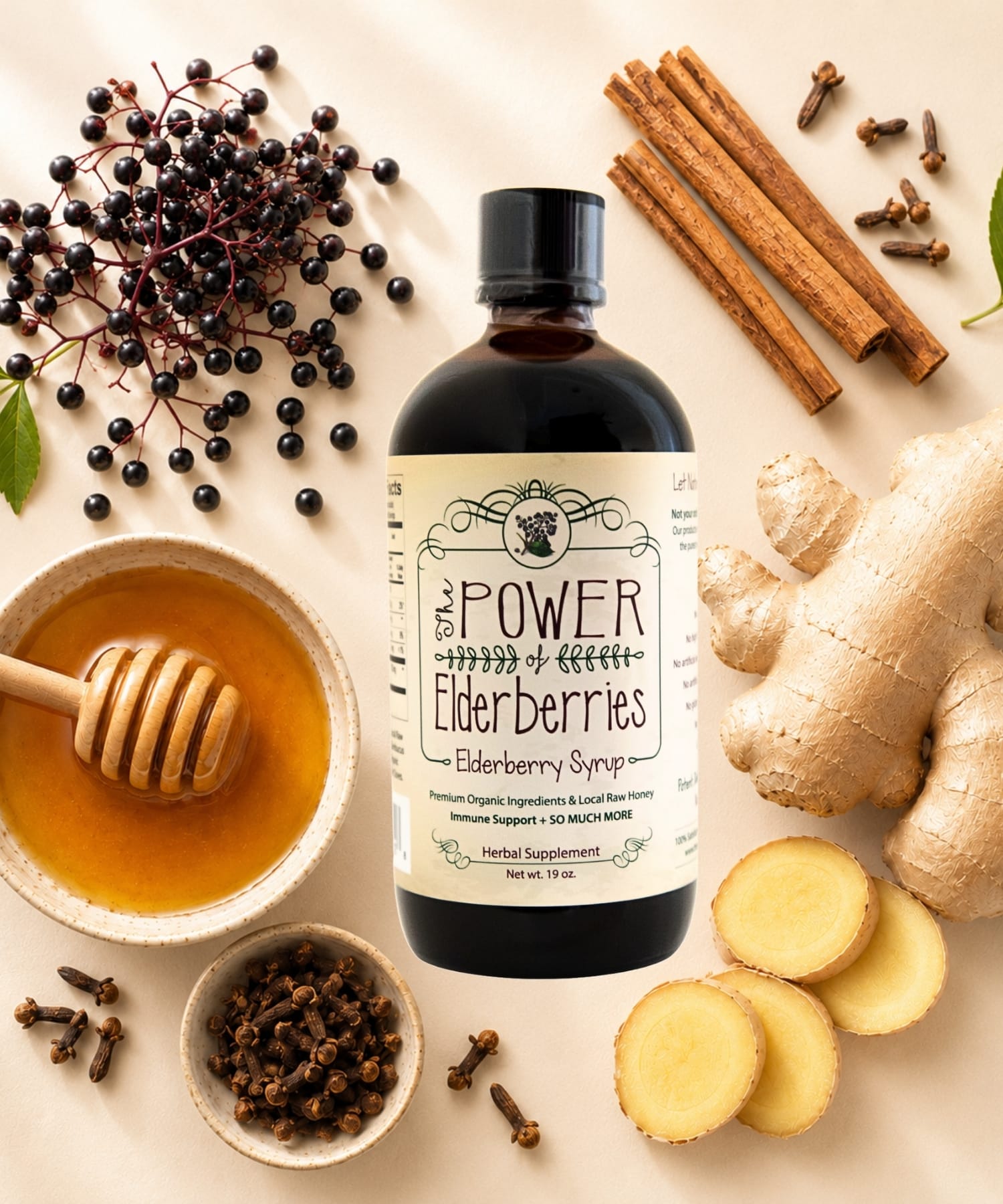 Organic black elderberries, ginger root, cinnamon sticks, and local raw honey used in elderberry syrup.