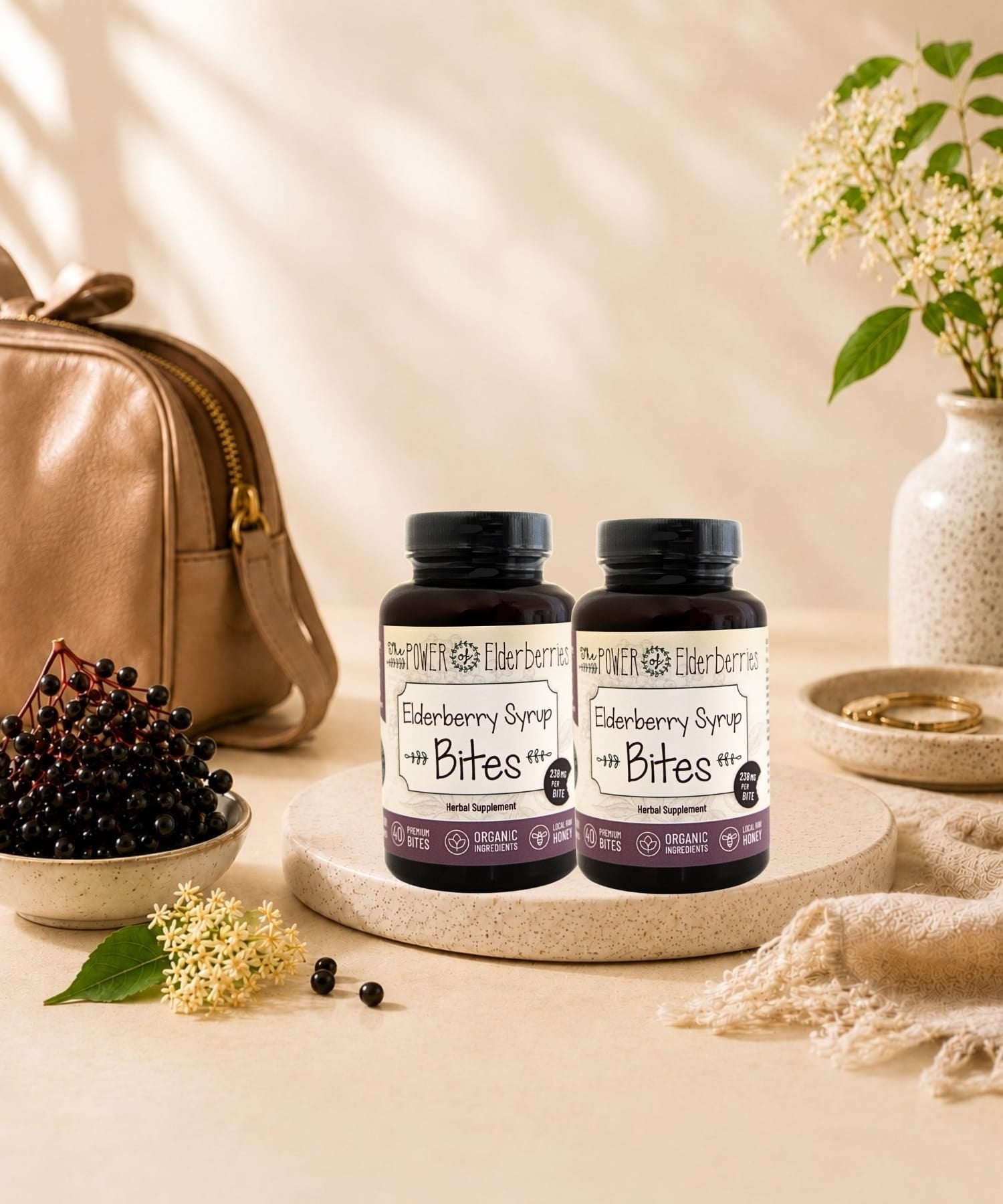 Two 40ct bottles of elderberry syrup bites displayed on a counter.