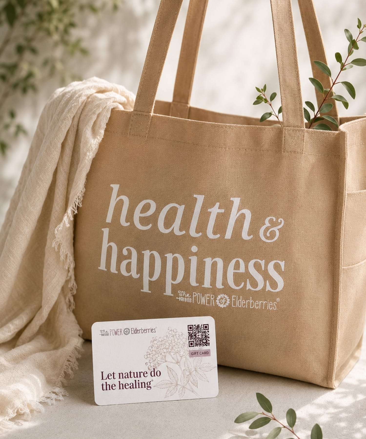 Wellness tote bag styled with gift card from The POWER of Elderberries®