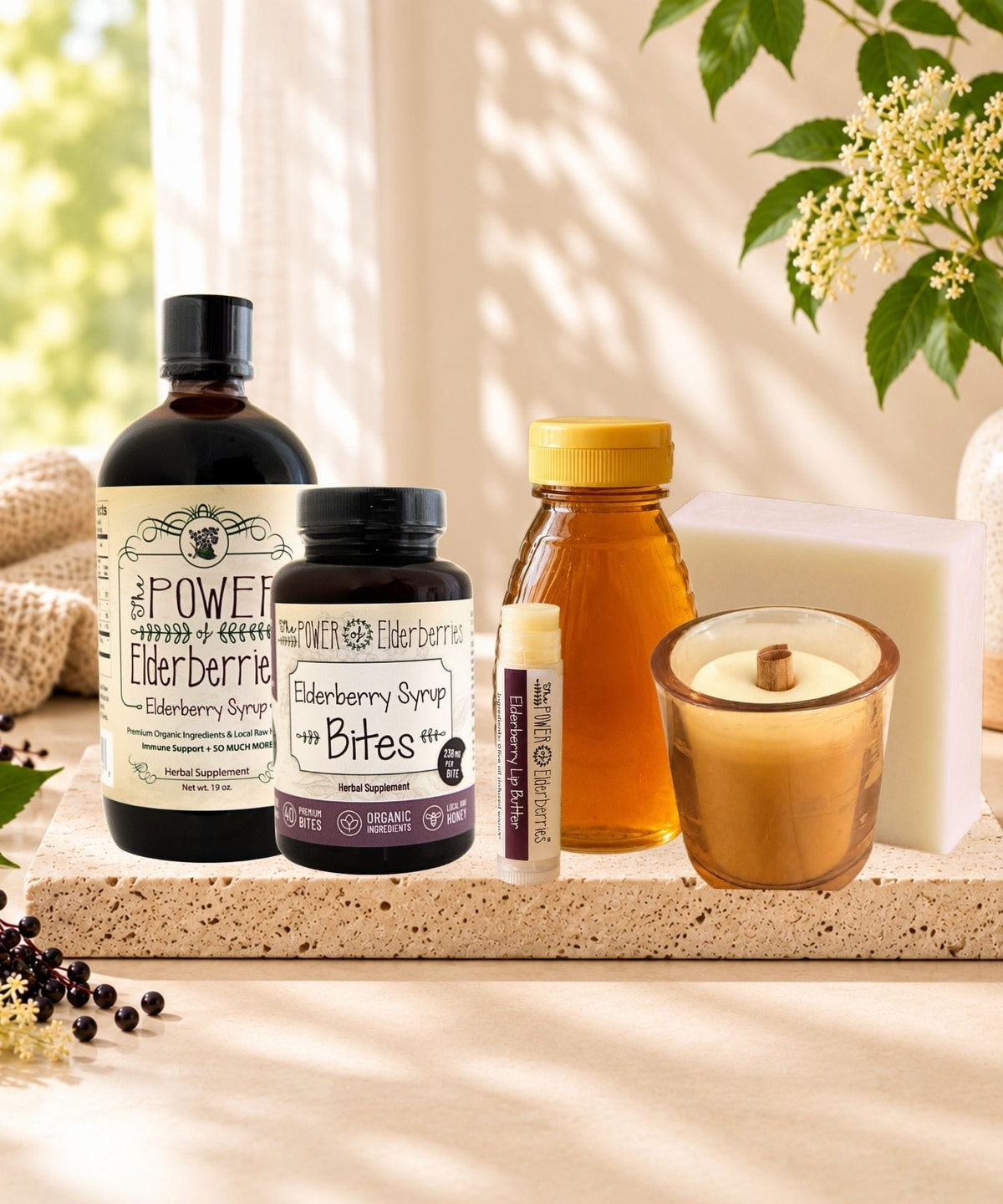Complete Wellness Ritual Bundle with elderberry syrup, Bites, honey, lip butter, votive candle, and handcrafted soap