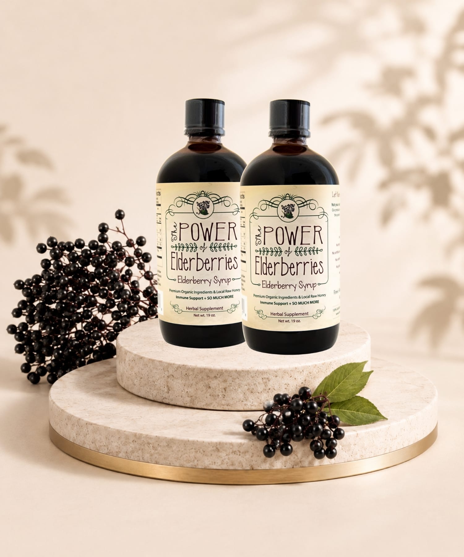 Daily Foundation Bundle two bottles of premium elderberry syrup sitting on a pedestal.