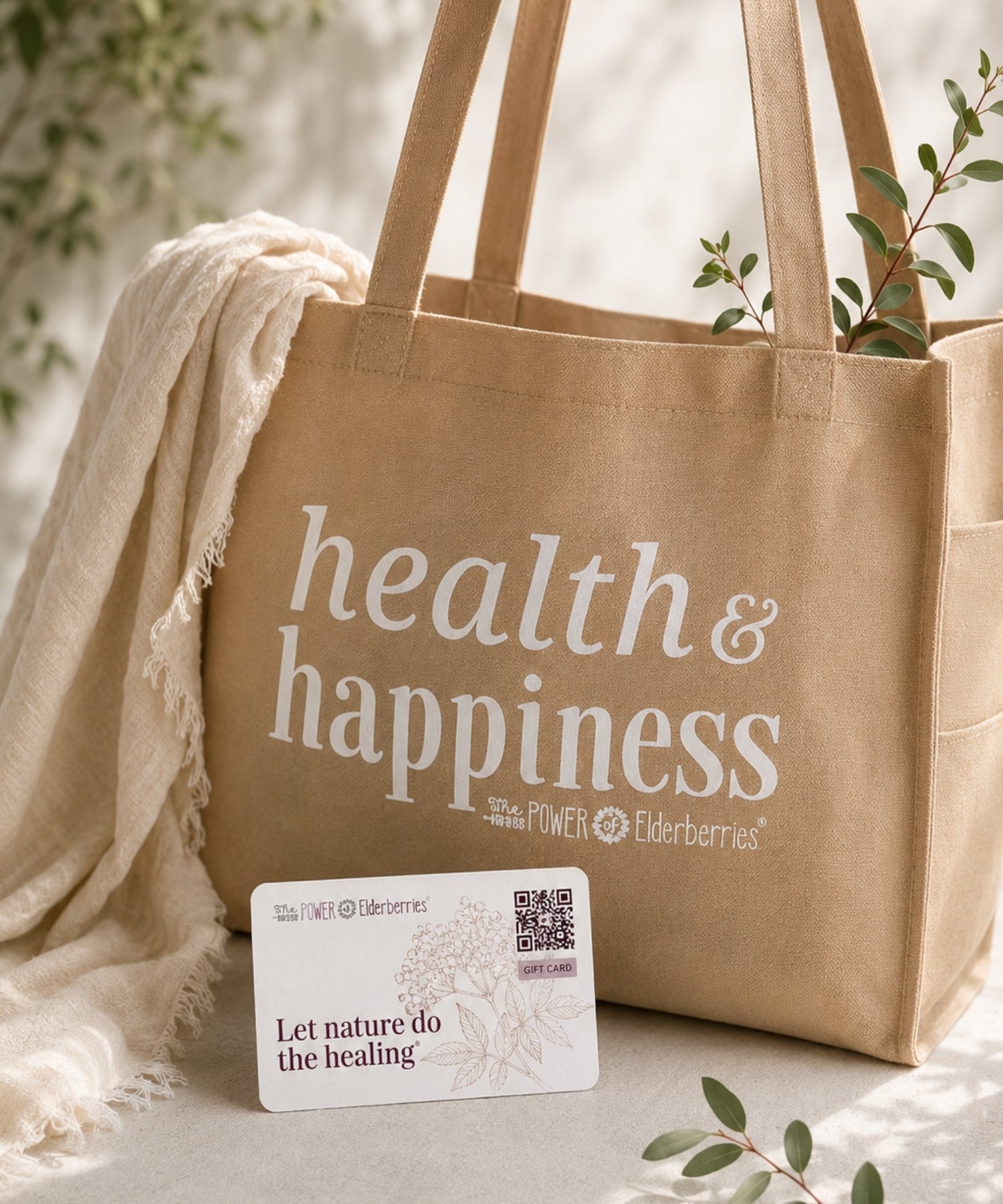 Wellness tote bag styled with gift card from The POWER of Elderberries®